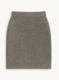 Fitted mini skirt with a straight shape and high rise design, featuring an elastic waistband.